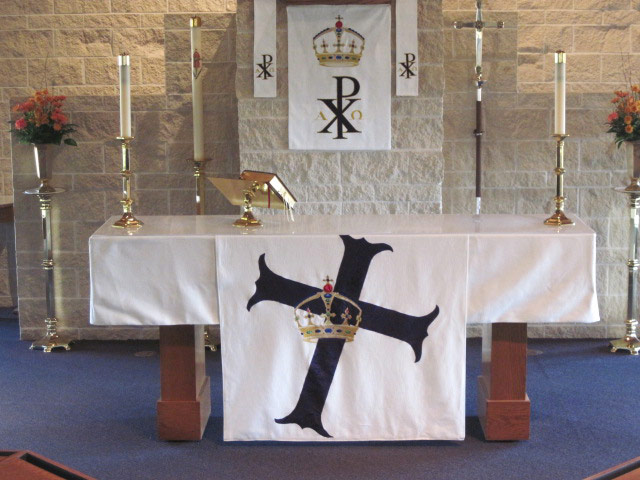Church paraments for the season of Christ the King. Set included the pastor's stole (not shown), an altar drape, suprafrontal, chalice veil (not shown), burse, pulpit drape, and Bible markers.